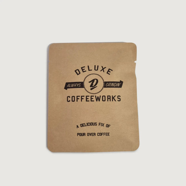 Deluxe's famous House Blend in a flat pack pour over.  Perfect for bike packing and travelling, you can leave all your coffee paraphernalia at home. But still have a great cup of coffee no matter where you are.